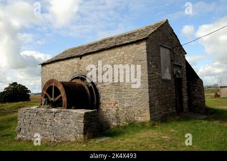 Wickelausrüstung im Long Engine House, Magpie Mine in der Nähe von Sheldon im Derbyshire Peak District. Die gesamte Website ist eine kostenlose Besucherattraktion. Stockfoto