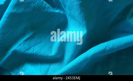 Blauer Baumwoll-Stoff mit Streifen, Satin-Hintergrund Nahaufnahme. Stockfoto
