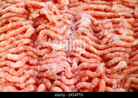 Rotes Hackfleisch Hintergrund in Nahaufnahme Stockfoto