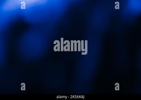 Blur glühen Hintergrund Bokeh Strahlen neonblau schwarz Stockfoto
