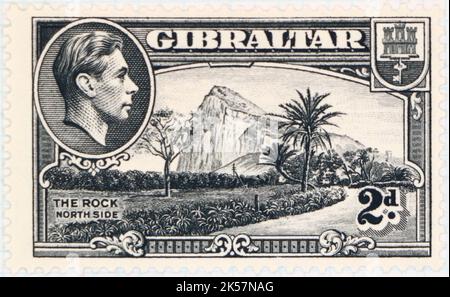 Foto einer Gibraltar-Briefmarke von 1940 mit einer Illustration der Rock North Side und König George VI 1940 Stockfoto