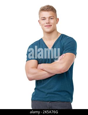 Gut aussehender junger Mann. Ein hübscher junger Mann kreuzt seine Arme auf weißem Hintergrund. Stockfoto
