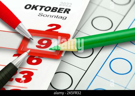 Deutscher Kalender 2022. Oktober 9 Sonntag mit Bleistiften rot schwarz grün Stockfoto