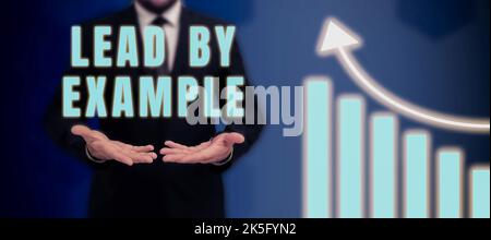 Handschriftliche Texte führen durch Beispiel. Geschäftsansatz Mentor sein Führungsrolle Befolgen Sie die Regeln Geben Sie Beispiele Coach Stockfoto