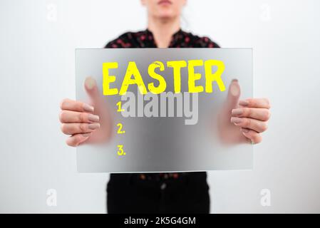 Schreiben mit Text Ostern. Geschäftsidee Feiertag zum Gedenken an die Auferstehung Jesu von den Toten Stockfoto