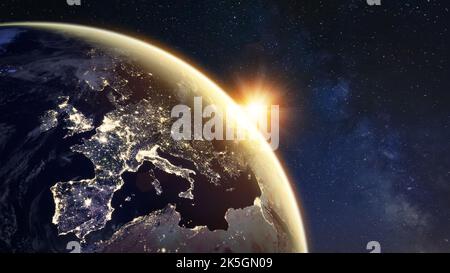 Sonnenaufgang auf dem Planeten Erde aus dem All mit Stadtlichtern in Europa, die Verbindungen zwischen europäischen Ländern zeigen. Elemente der NASA. Technologie, g Stockfoto