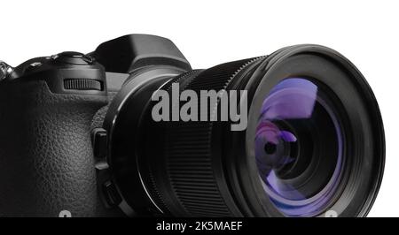Spiegellose Fotokamera mit Zoomobjektiv auf weißem Hintergrund Stockfoto