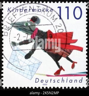 DEUTSCHLAND - UM 1999: Ein in Deutschland gedruckter Stempel zeigt Mäuse, für die Kinder, um 1999 Stockfoto