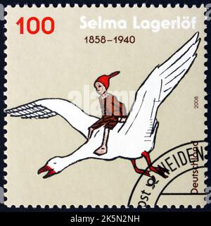 DEUTSCHLAND - UM 2008: Eine in Deutschland gedruckte Briefmarke zeigt Nils Holgersson auf Gans (aus den wunderbaren Abenteuern von Nils von Selma Lagerloof), 150. geboren Stockfoto