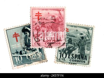 Eine Montage von alten Briefmarken aus Spanien auf weißem Hintergrund. Stockfoto