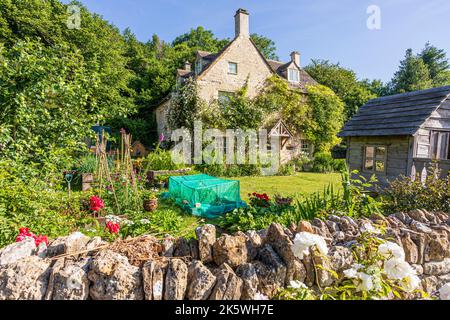 Snows Farm, ein traditionelles Cotswold-Farmgebäude in der Steanbridge Lane in der Nähe von Slad, Gloucestershire, Großbritannien Stockfoto