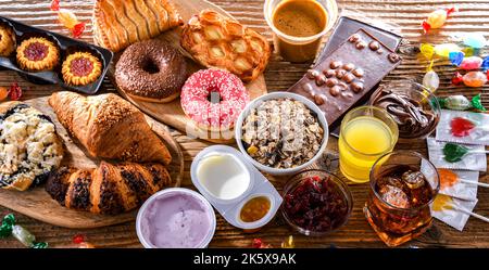 Lebensmittel, die eine erhebliche Menge an Zucker enthalten. Junk Food. Stockfoto