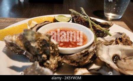 Austern Shellfish on the Table Dining Stockfoto