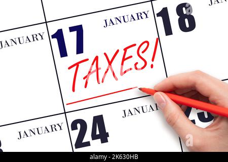17. Tage im Januar. Handzeichnung rote Linie und Schreiben des Textes Steuern am Kalenderdatum Januar 17. Datum der Steuerzahlung erinnern. Tax-Day-Konzept. Winter Stockfoto