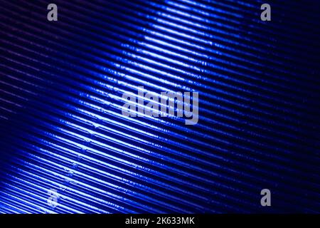 Gewellte Textur Neon Licht Hintergrund blau leuchten Stockfoto