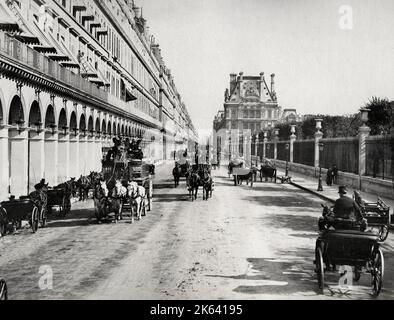 Vintage 19. Jahrhundert Foto: Kutschenverkehr auf der Rue de Rivoli, Paris, Frankreich Stockfoto