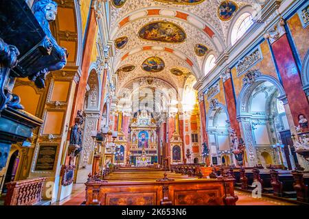 WIEN, ÖSTERREICH - 17. FEBRUAR 2019: Innenraum der Schottenkirche, am 17. Februar in Wien, Österreich Stockfoto