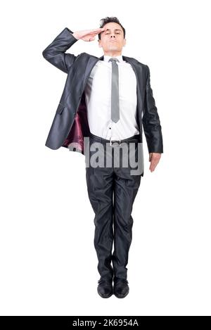 Ernsthafter Mann grüssend im Studio. Weißer Hintergrund. Stockfoto