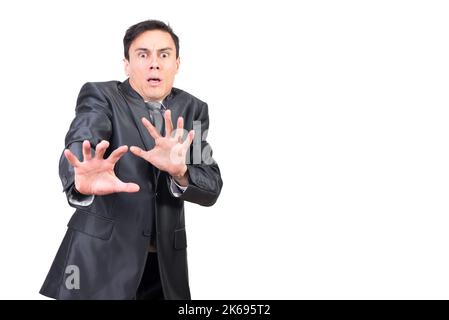 Schockiert Geschäftsmann gestikulierend und Blick auf die Kamera mit verängstigten Gesicht Stockfoto