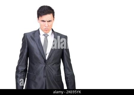 Serious junge männliche Manager Blick auf die Kamera in weißem Studio Stockfoto