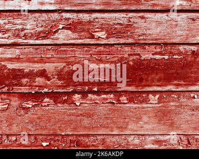 Eine abblätternde Farbe rot Holz Hauswand gemalt Haus verwittert Bretter Hütte Gebäude Hintergrund Schuppen Bord Bauernhof Scheune Bauernhaus Abstellgleis hölzerne Kulisse Stockfoto