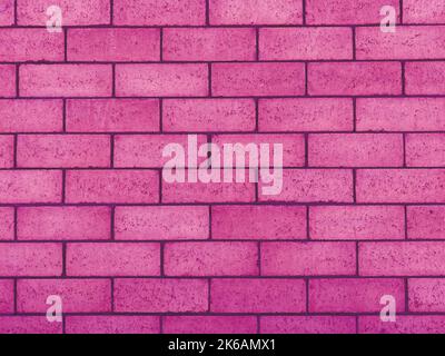 Ein rosa Zunder Block Betonwand lackiert Schatten Gebäude starke Schatten Closeup Zement Gartenfassade Stockfoto