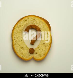 Brot und Fragen Stockfoto