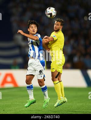 Takefusa Kubo von Real Sociedad und Kiko Femenias von Villarreal CF während des La Liga-Spiels zwischen Real Sociedad und Villarreal CF spielten am 9. Oktober 2022 im Real Arena Stadium in San Sebastian, Spanien. (Foto von Cesar Ortiz / PRESSIN) Stockfoto