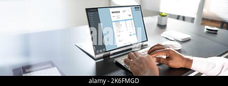 Online Digital E Invoice Statement auf Hybrid Laptop Stockfoto