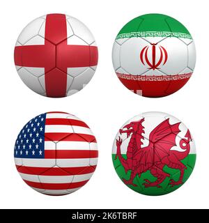 Fußballbälle mit den Flaggen der Mannschaften der Gruppe B der FIFA Fußball-Weltmeisterschaft 2022 - England, Iran, USA und Wales Stockfoto