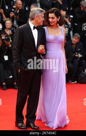 George Clooney, Amal Clooney bei der Ankunft zur Premiere von Suburbicon Red Carpet im Sala Grande während des Filmfestivals von Venedig 74. Stockfoto