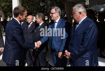 Der französische Präsident Emmanuel Macron, der französische Innenminister Gerard Collomb, Nicolas Sarkozy, Richard Ferrand und Gerard Larcher. Der französische Präsident Emmanuel Macron und Brigitte Macron nehmen an einer nationalen Zeremonie Teil, um die Opfer des Terrorismus zu ehren. Paris, FRANKREICH-19/09/2018 Stockfoto