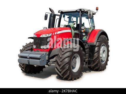 Neuer roter Traktor auf weißem Hintergrund isoliert, mit Abschneideweg Stockfoto