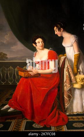 ©Active Museu/MAXPPP - ActiveMuseum 0005952.jpg / Portrait d'Anne Louise Felicite Riesener nee Longroy, epouse du peintre, et sa soeur Adelaide Anne Longroy, Le peintre est le celebre ebeniste de Louis XVI, et a ete un des plus celebres portraitistes de son temps. Napoleon posa meme pour lui ainsi que l'imperatrice Josephine / Henri Francois Riesener / Peinture Active Museum / Le Pictorium 2 Personen, wolkiger Himmel, Drape, Ganzkörperaufnahme, Spitze, Palast, rotes Kleid, Vertikal, weißes Kleid, Frauen, Schreibkoffer, Anne Louise Felicite Riesener, 19.. Jahrhundert, Henri Francois Riesener, Malerei, Stockfoto