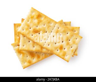 Cracker übereinander auf weißem Hintergrund platziert. Von oben gesehen. Stockfoto