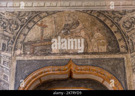 Wandmalereien im Kreuzgang rund um den Innenhof des Klosters Santiago Apostol im 16.. Jahrhundert von den Spaniern gebaut, um die Mi zu konvertieren Stockfoto