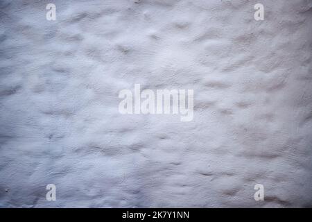 Bemalte weiße alte Wand als Textur und grunge Hintergrund Stockfoto