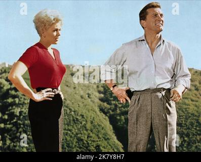 Kim Novak & Kirk Douglas Film: Strangers When We Meet (USA 1960) Charaktere: Margaret 'Maggie' Gault & Larry Coe / Literaturverfilmung (nach dem Buch von Evan Hunter) Regie: Richard Quine 29 June 1960 **WARNUNG** Dieses Foto ist nur für redaktionelle Verwendung bestimmt und unterliegt dem Copyright von BRYNA PRODUCTIONS und/oder dem Fotografen, der von der Film- oder Produktionsfirma beauftragt wurde, und kann nur von Publikationen im Zusammenhang mit der Bewerbung des oben genannten Films reproduziert werden. Eine obligatorische Gutschrift an BRYNA-PRODUKTIONEN ist erforderlich. Der Fotograf sollte auch bei Bekanntwerden des Fotos gutgeschrieben werden. Eine kommerzielle Nutzung ist nicht möglich Stockfoto