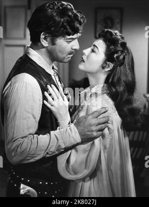 Clark Gable & Ava Gardner Film: Lone Star (USA 1952) Charaktere: Devereaux Burke, Martha Ronda Regie: Vincent Sherman 31 January 1952 **WARNUNG** Dieses Foto ist nur für redaktionelle Zwecke bestimmt und unterliegt dem Copyright von MGM und/oder dem von der Film- oder Produktionsfirma beauftragten Fotografen und kann nur von Publikationen im Zusammenhang mit der Bewerbung des oben genannten Films reproduziert werden. Eine obligatorische Gutschrift an MGM ist erforderlich. Der Fotograf sollte auch bei Bekanntwerden des Fotos gutgeschrieben werden. Ohne schriftliche Genehmigung der Film Company kann keine kommerzielle Nutzung gewährt werden. Stockfoto