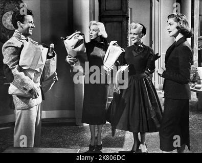 Rory Calhoun, Marilyn Monroe, Betty Grable & Lauren Bacall Film: How to Marry A Millionaire (USA 1953) Charaktere: Eben, Pola Debevoise, Loco Dempsey, Schatze Page Regie: Jean Negulesco 04. November 1953 **WARNUNG** Dieses Foto ist nur für redaktionelle Verwendung bestimmt und unterliegt dem Copyright von 20. CENTURY FOX und/oder des Fotografen, der von der Film- oder Produktionsfirma beauftragt wurde, und kann nur durch Publikationen im Zusammenhang mit der Bewerbung des oben genannten Films reproduziert werden. Eine obligatorische Gutschrift an 20. CENTURY FOX ist erforderlich. Der Fotograf sollte auch bei Bekanntwerden des Fotos gutgeschrieben werden. Keine kommerzielle Nutzung kann GRA sein Stockfoto