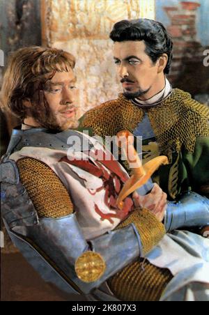 Mel Ferrer & Robert Taylor Film: Knights of the Round Table (USA 1953) Charaktere: Arthur & Lancelot Regie: Richard Thorpe 22 December 1953 **WARNUNG** Dieses Foto ist nur für redaktionelle Zwecke bestimmt und unterliegt dem Copyright von MGM und/oder dem Fotografen, der von der Film- oder Produktionsfirma beauftragt wurde, und kann nur durch Publikationen im Zusammenhang mit der Bewerbung des oben genannten Films reproduziert werden. Eine obligatorische Gutschrift an MGM ist erforderlich. Der Fotograf sollte auch bei Bekanntwerden des Fotos gutgeschrieben werden. Ohne schriftliche Genehmigung der Film Company kann keine kommerzielle Nutzung gewährt werden. Stockfoto