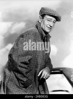 John Wayne Film: The Quiet man (USA 1952) Charaktere: Sean Thornton Regie: John Farrow 06 June 1952 **WARNUNG** Dieses Foto ist nur für redaktionelle Zwecke bestimmt und unterliegt dem Copyright von REPUBLIC PICTURES und/oder des Fotografen, der von der Film- oder Produktionsfirma beauftragt wurde und darf nur von Publikationen im Zusammenhang mit der Bewerbung des oben genannten Films reproduziert werden. Eine obligatorische Gutschrift für REPUBLIKANISCHE BILDER ist erforderlich. Der Fotograf sollte auch bei Bekanntwerden des Fotos gutgeschrieben werden. Ohne schriftliche Genehmigung der Film Company kann keine kommerzielle Nutzung gewährt werden. Stockfoto