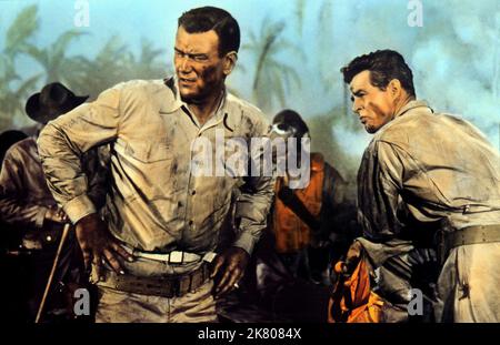 John Wayne & Robert Ryan Film: Flying Leathernecks (1957) Charaktere: Maj. Daniel Xavier Kirby & Capt. Carl „Griff“ Griffin Regie: Nicholy Ray 28 August 1951 **WARNUNG** Dieses Foto ist nur für redaktionelle Zwecke bestimmt und unterliegt dem Copyright von RKO und/oder des Fotografen, der von der Film- oder Produktionsfirma beauftragt wurde, und kann nur von Publikationen im Zusammenhang mit der Bewerbung des oben genannten Films reproduziert werden. Eine obligatorische Gutschrift an RKO ist erforderlich. Der Fotograf sollte auch bei Bekanntwerden des Fotos gutgeschrieben werden. Ohne schriftliche Genehmigung der Film Company kann keine kommerzielle Nutzung gewährt werden. Stockfoto