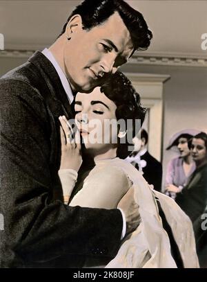 Rock Hudson & Elizabeth Taylor Film: Giant (USA 1956) Charaktere: Jordan 'Bick' Benedict Jr. & Leslie Benedict / Literaturverfilmung (nach dem Buch von Edna Ferber) Regie: George Stevens 10 October 1956 **WARNUNG** Dieses Foto ist nur für redaktionelle Zwecke bestimmt und unterliegt dem Copyright von WARNER BROS. Und/oder des Fotografen, der von der Film- oder Produktionsfirma beauftragt wurde und nur durch Publikationen im Zusammenhang mit der Bewerbung des oben genannten Films reproduziert werden kann. Eine obligatorische Gutschrift an WARNER BROS. Ist erforderlich. Der Fotograf sollte auch bei Bekanntwerden des Fotos gutgeschrieben werden. Eine kommerzielle Nutzung kann nicht gewährt werden Stockfoto