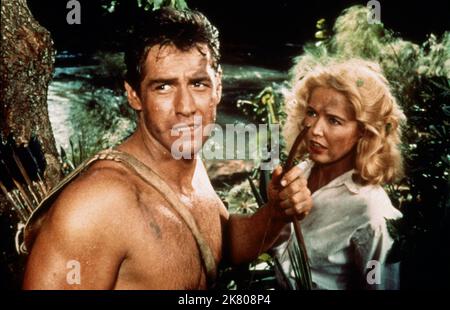 Gordon Scott & Sara Shane Film: Tarzan'S Greatest Adventure (USA 1959) Charaktere: Tarzan & Angie Regie: John Guillermin 08 July 1959 **WARNUNG** Dieses Foto ist nur für den redaktionellen Gebrauch bestimmt und unterliegt dem Copyright von SOLARFILMPRODUKTIONEN und/oder dem Fotografen, der von der Film oder Production Company beauftragt wurde, und kann nur von Publikationen im Zusammenhang mit der Bewerbung des oben genannten Films reproduziert werden. Eine obligatorische Gutschrift für SOLARFILMPRODUKTIONEN ist erforderlich. Der Fotograf sollte auch bei Bekanntwerden des Fotos gutgeschrieben werden. Ohne schriftliche Genehmigung der Film Company kann keine kommerzielle Nutzung gewährt werden. Stockfoto