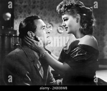 Robert Ryan & Shelley Winters Film: Odds Against Tomorrow (1955) Charaktere: Earle Slater & Lorry Regie: Robert Wise 15 October 1959 **WARNUNG** Dieses Foto ist nur für redaktionelle Verwendung bestimmt und unterliegt dem Copyright von UNITED ARTISTS und/oder dem von der Film- oder Produktionsgesellschaft beauftragten Fotografen und kann nur durch Publikationen im Zusammenhang mit der Bewerbung des oben genannten Films reproduziert werden. Eine obligatorische Gutschrift für UNITED ARTISTS ist erforderlich. Der Fotograf sollte auch bei Bekanntwerden des Fotos gutgeschrieben werden. Ohne schriftliche Genehmigung der Film Company kann keine kommerzielle Nutzung gewährt werden. Stockfoto