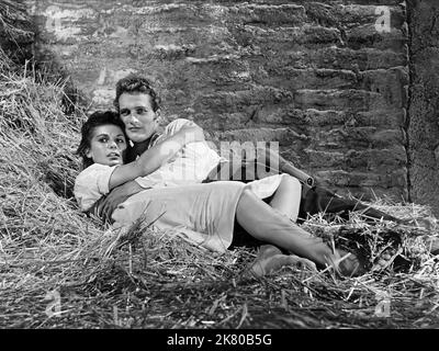 Lita Milan & Paul Newman Film: The Left Handed Gun (USA 1958) Charaktere: Celsa & Billy the Kid Regie: Arthur Penn 07 May 1958 **WARNUNG** Dieses Foto ist nur für redaktionelle Zwecke bestimmt und unterliegt dem Copyright von WARNER BROS. Und/oder des Fotografen, der von der Film- oder Produktionsfirma beauftragt wurde und nur durch Publikationen im Zusammenhang mit der Bewerbung des oben genannten Films reproduziert werden kann. Eine obligatorische Gutschrift an WARNER BROS. Ist erforderlich. Der Fotograf sollte auch bei Bekanntwerden des Fotos gutgeschrieben werden. Ohne schriftliche Genehmigung der Film Company kann keine kommerzielle Nutzung gewährt werden. Stockfoto