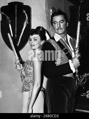 Alice Kelley & Errol Flynn Film: Against All Flags (USA 1952) Charaktere: Princess Patma, Brian Hawke Regie: George Sherman 21 November 1952 **WARNUNG** Dieses Foto ist nur für redaktionelle Verwendung bestimmt und unterliegt dem Copyright von UNIVERSAL und/oder dem Fotografen, der von der Film- oder Produktionsfirma beauftragt wurde und kann nur durch Publikationen im Zusammenhang mit der Bewerbung des oben genannten Films reproduziert werden. Eine obligatorische Gutschrift an UNIVERSAL ist erforderlich. Der Fotograf sollte auch bei Bekanntwerden des Fotos gutgeschrieben werden. Ohne schriftliche Genehmigung der Film Company kann keine kommerzielle Nutzung gewährt werden. Stockfoto