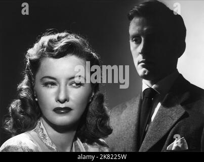 Barbara Stanwyck & Kirk Douglas Film: The Strange Love of Martha Ivers (USA 1946) Charaktere: Martha Ivers, Walter O'Neil Regie: Lewis Milestone 24 July 1946 **WARNUNG** Dieses Foto ist nur für redaktionelle Zwecke bestimmt und unterliegt dem Copyright von PARAMOUNT und/oder des Fotografen, der von der Film- oder Produktionsfirma beauftragt wurde und darf nur von Publikationen im Zusammenhang mit der Bewerbung des oben genannten Films reproduziert werden. Eine obligatorische Gutschrift an PARAMOUNT ist erforderlich. Der Fotograf sollte auch bei Bekanntwerden des Fotos gutgeschrieben werden. Ohne schriftliche Genehmigung der Film Company kann keine kommerzielle Nutzung gewährt werden. Stockfoto