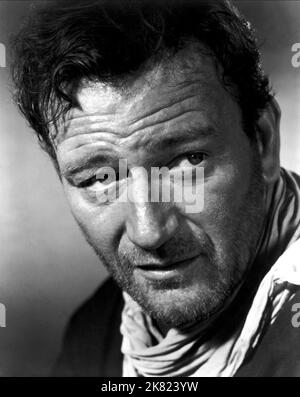 John Wayne Film: 3 Pate; Drei Pate (1941) Charaktere: Robert Marmaduke Hightower Regie: John Ford 01 December 1948 **WARNUNG** Dieses Foto ist nur für redaktionelle Zwecke bestimmt und unterliegt dem Copyright von MGM und/oder dem Fotografen, der von der Film- oder Produktionsfirma beauftragt wurde, und kann nur von Publikationen im Zusammenhang mit der Bewerbung des oben genannten Films reproduziert werden. Eine obligatorische Gutschrift an MGM ist erforderlich. Der Fotograf sollte auch bei Bekanntwerden des Fotos gutgeschrieben werden. Ohne schriftliche Genehmigung der Film Company kann keine kommerzielle Nutzung gewährt werden. Stockfoto